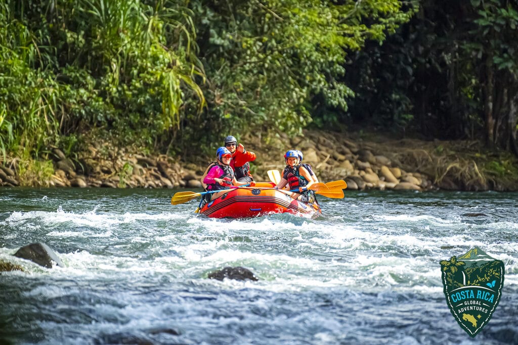 a group of people in a white water raft
