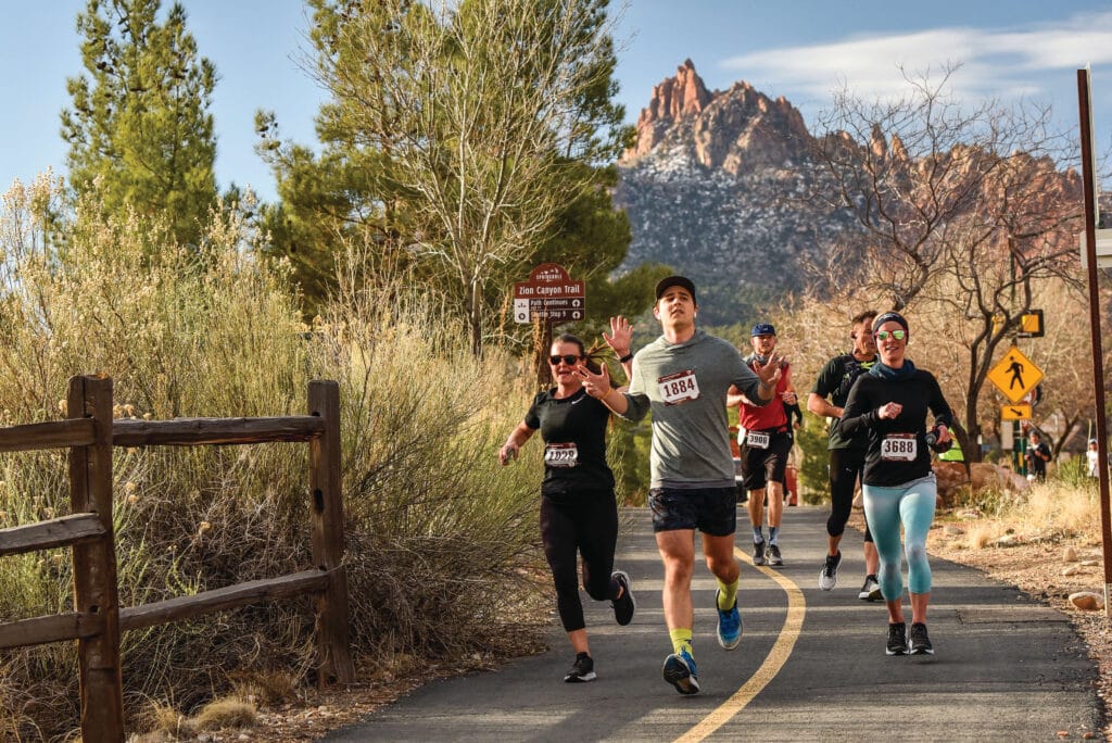 Runners on a paved bike path