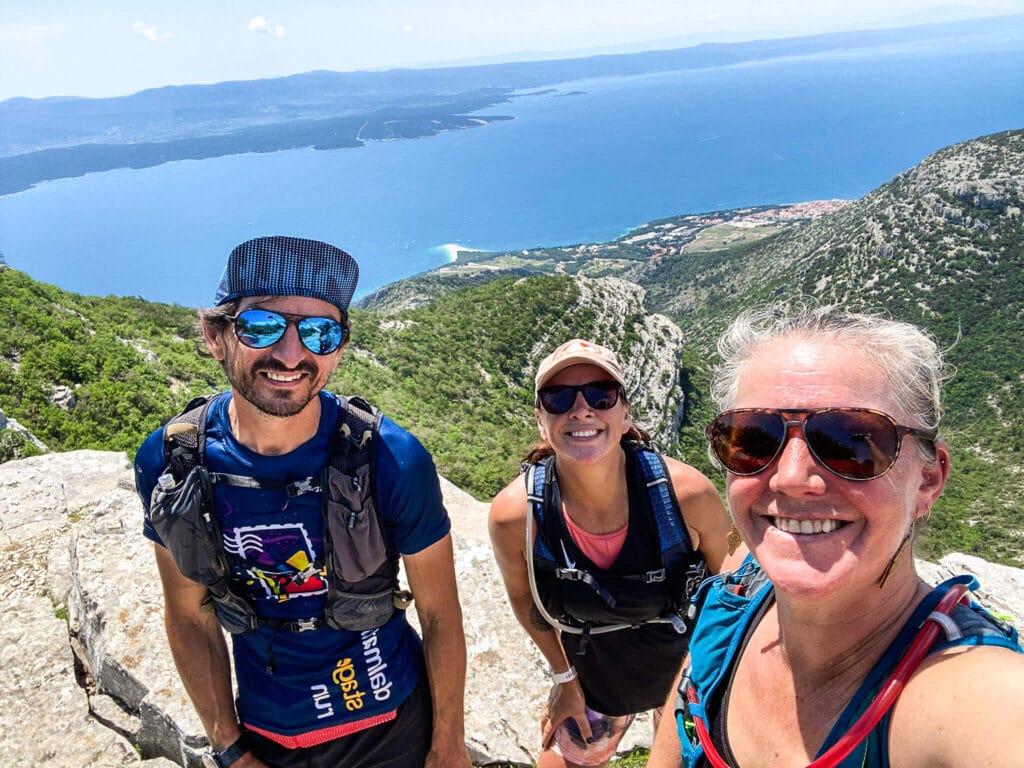The Global Adventures staff with the sea behind them