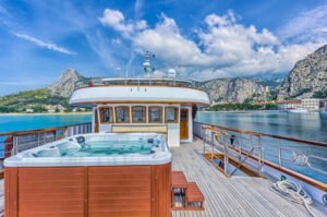 One of the outside decks on a yacht with a jacuzzi
