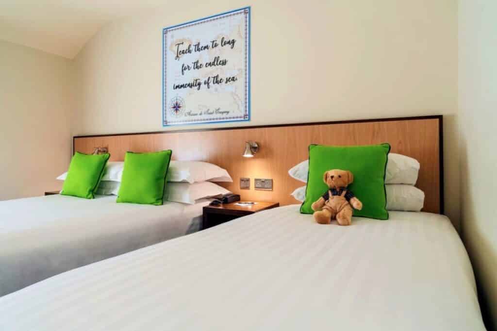 Two beds in an airy room at the Mariner Hotel