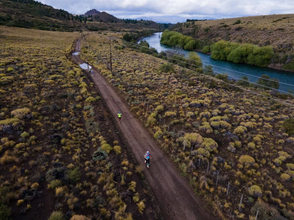aerial shot of runners along limay river