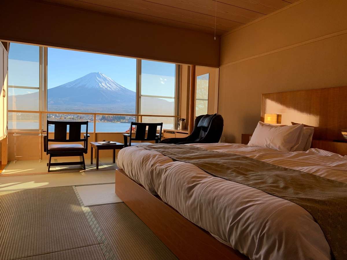 A shady hotel contemporary hotel room at Sunnide in Kayaguchiko with a view of Mount Fuji