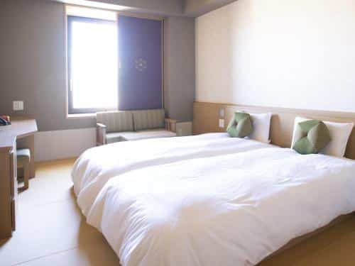 A simple modern hotel room at hotel Onyado Nono in Kyoto Japan