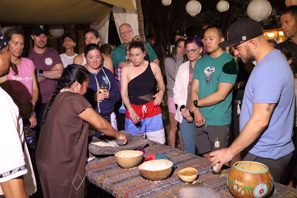 Global Adventures Vacation races runners learn to make tortillas by locals in Belize