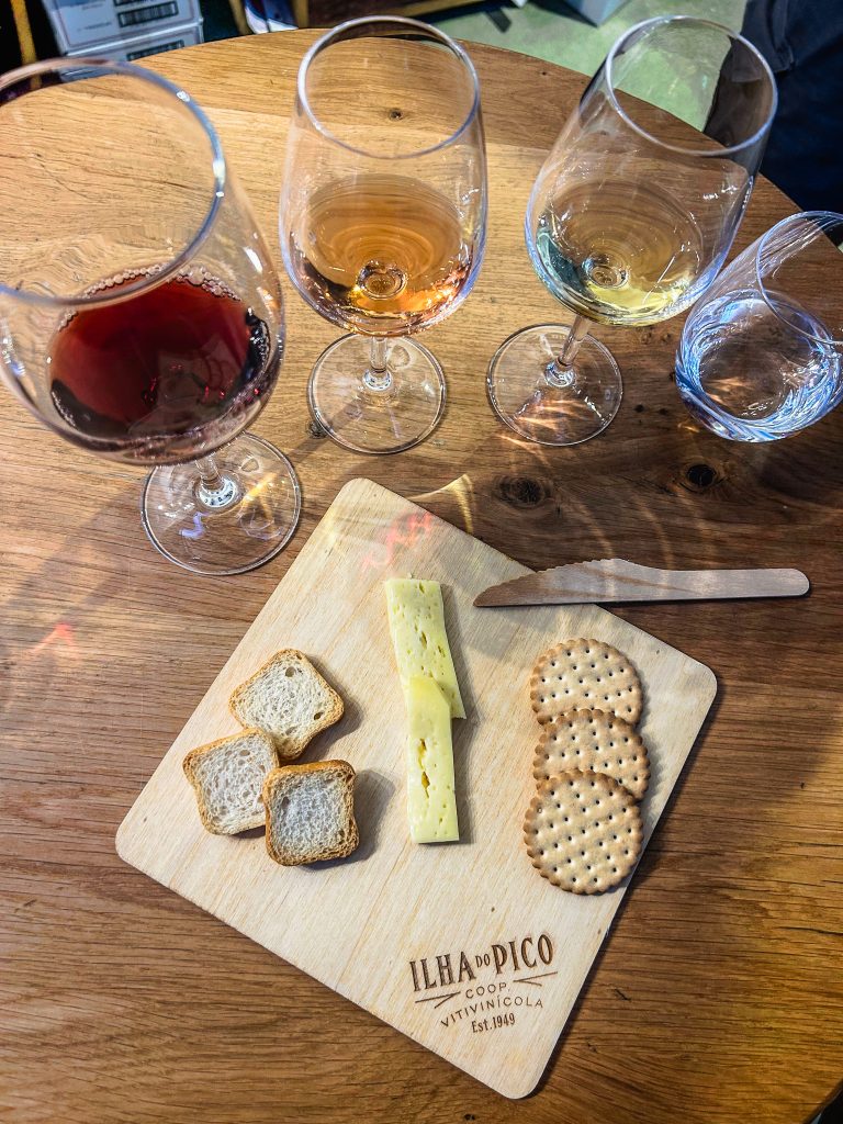 A spread of cheese and wine from a local volcanic vineyard on Faial Portugal in the Azores
