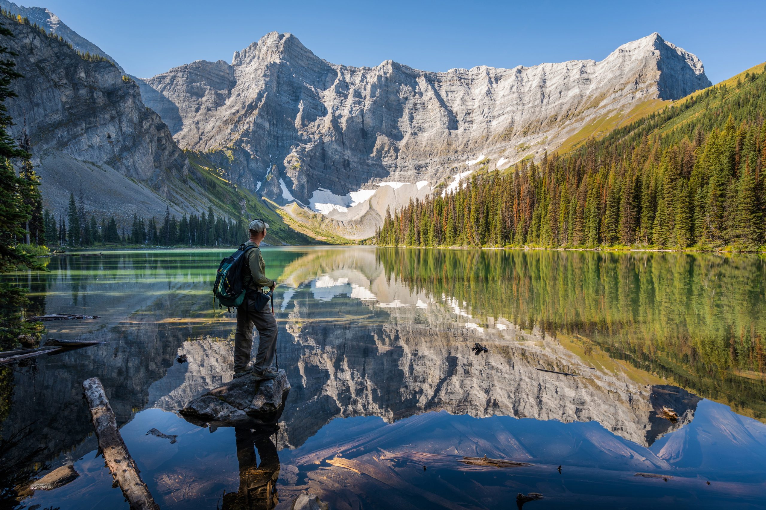 Hiker Looking at View at Rawson Lake in Kananaskis Country, Alberta, Canada